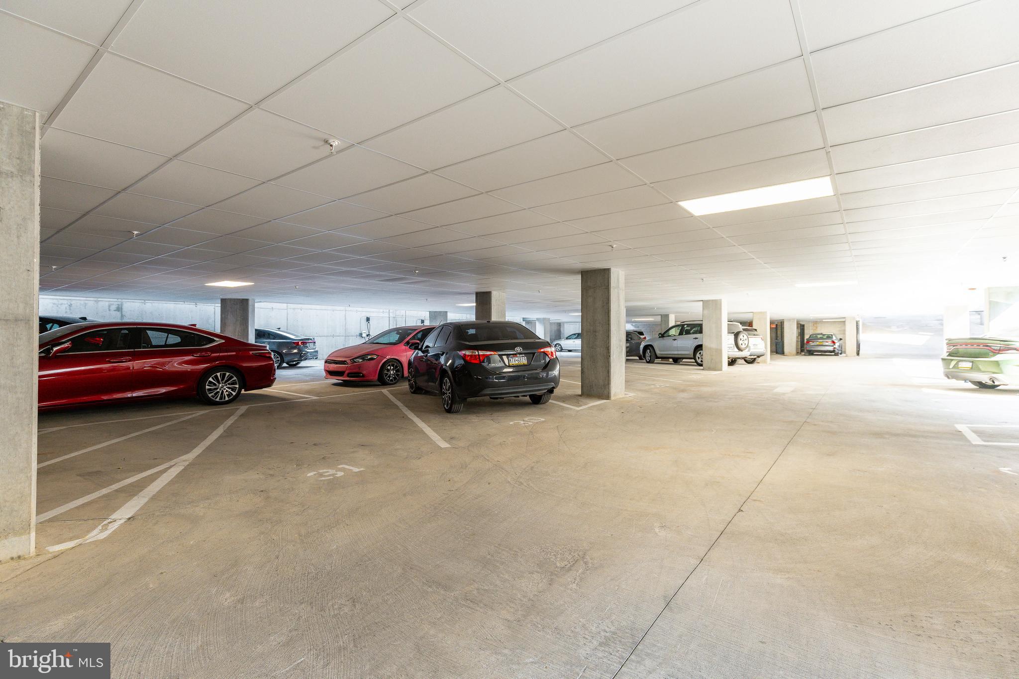 6910 Ridge Avenue, Unit 209 Philadelphia, PA 19128 - Photo 17 of 21 a view of cars parked in a parking lot