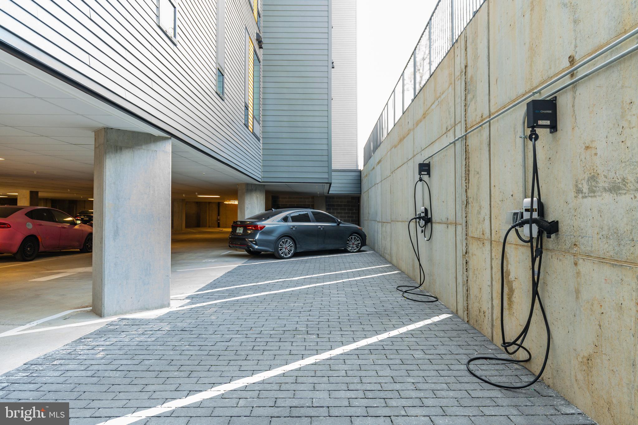 6910 Ridge Avenue, Unit 209 Philadelphia, PA 19128 - Photo 20 of 21 a view of a street with cars parked