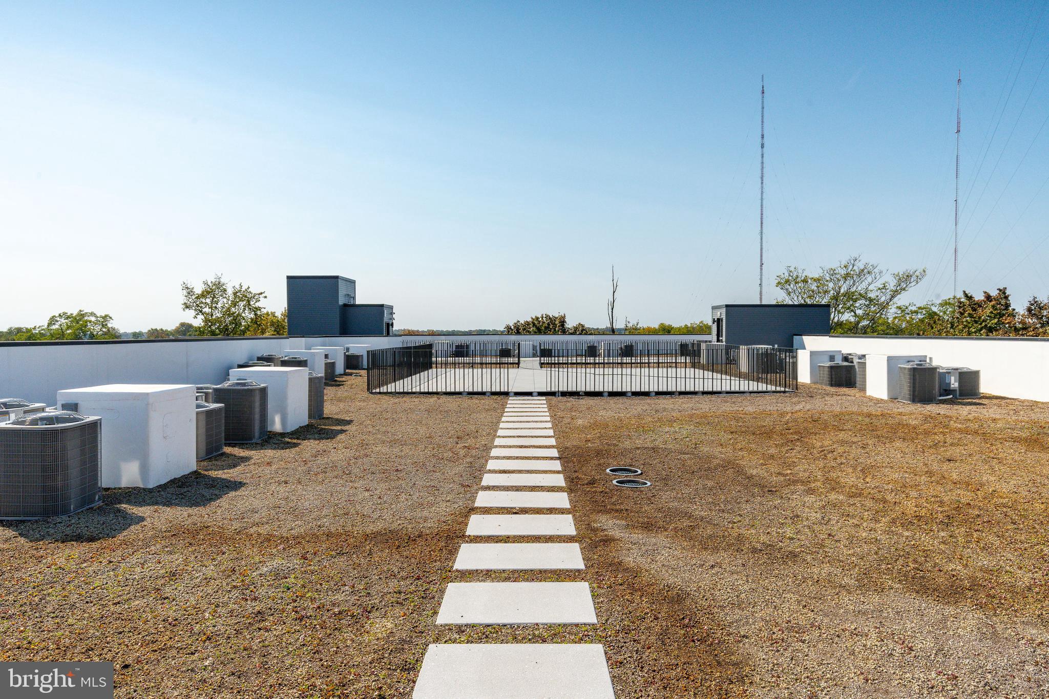 6910 Ridge Avenue, Unit 209 Philadelphia, PA 19128 - Photo 21 of 21 a view of a terrace with lawn chairs