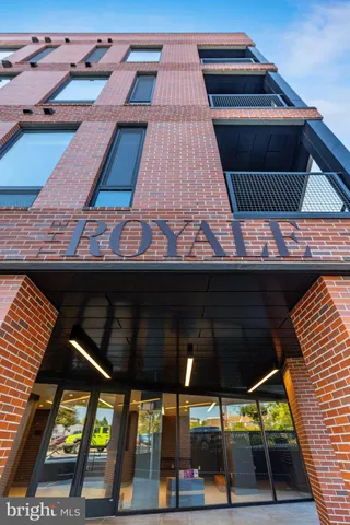 a view of a building with a porch