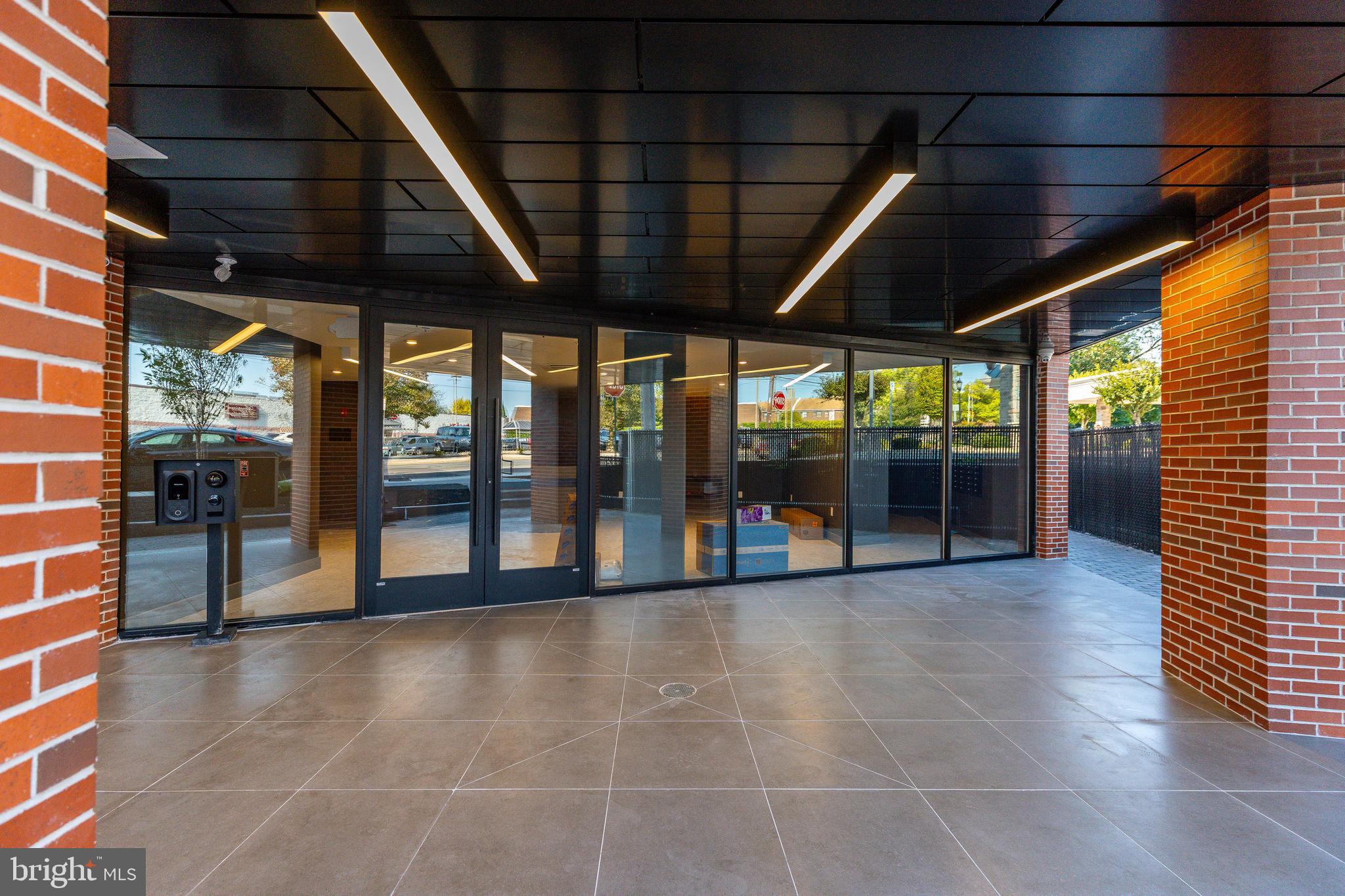 6910 Ridge Avenue, Unit 209 Philadelphia, PA 19128 - Photo 5 of 21 a view of a building with a porch