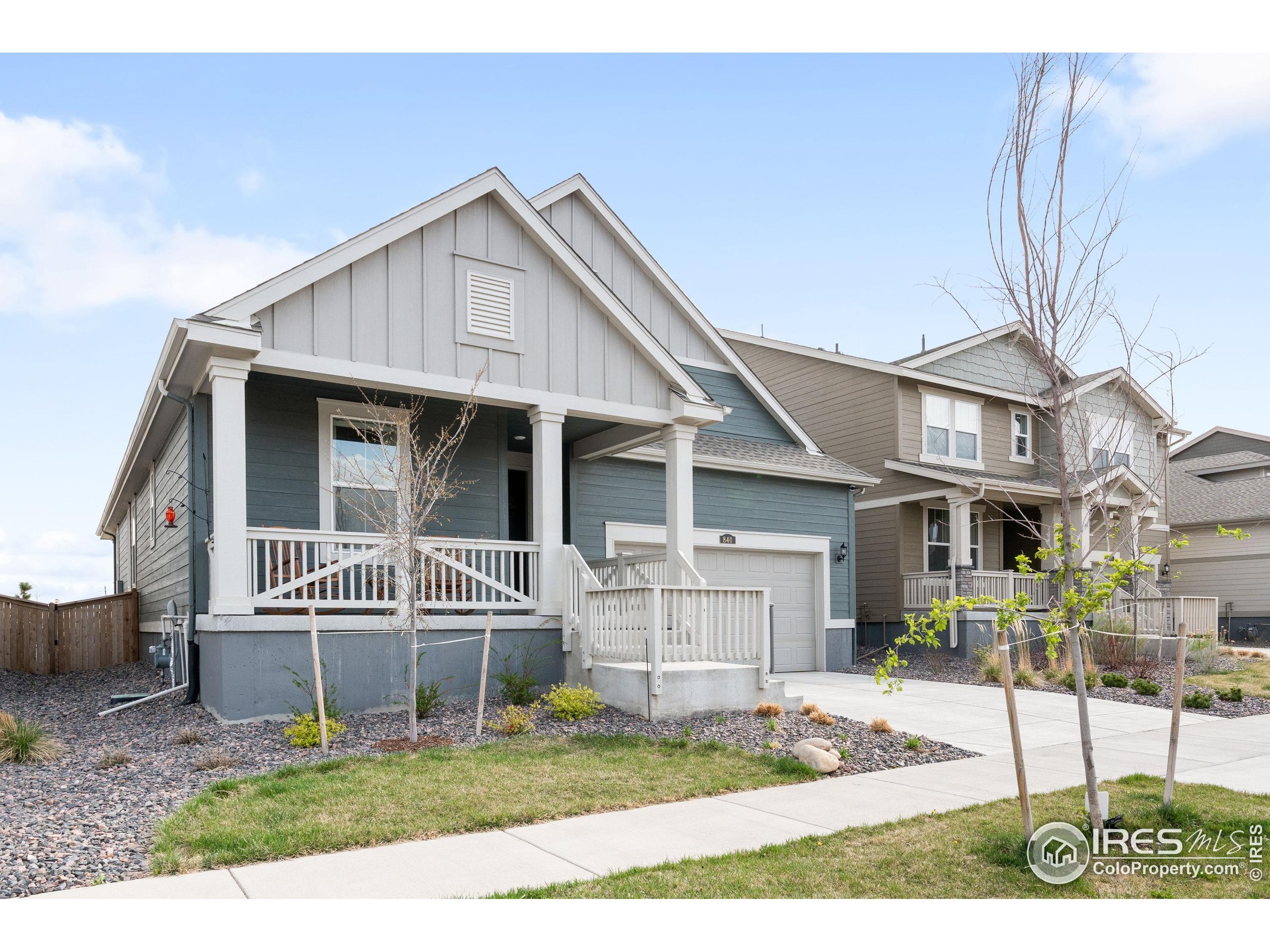 840 Clover Loop Lafayette, CO 80026 - Photo 2 of 39 a view of house with a yard