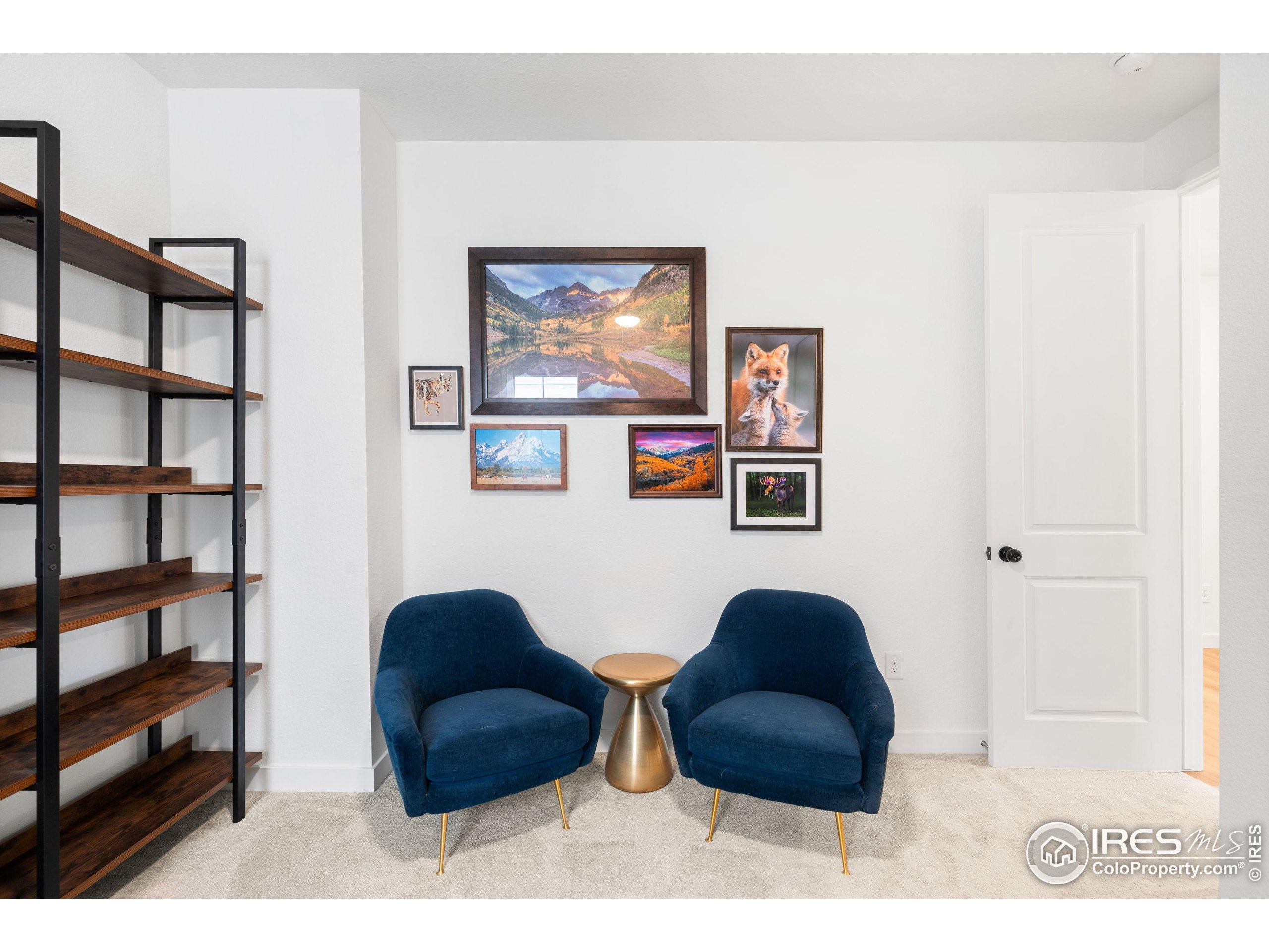 840 Clover Loop Lafayette, CO 80026 - Photo 26 of 39 a bathroom with a toilet a sink and a mirror