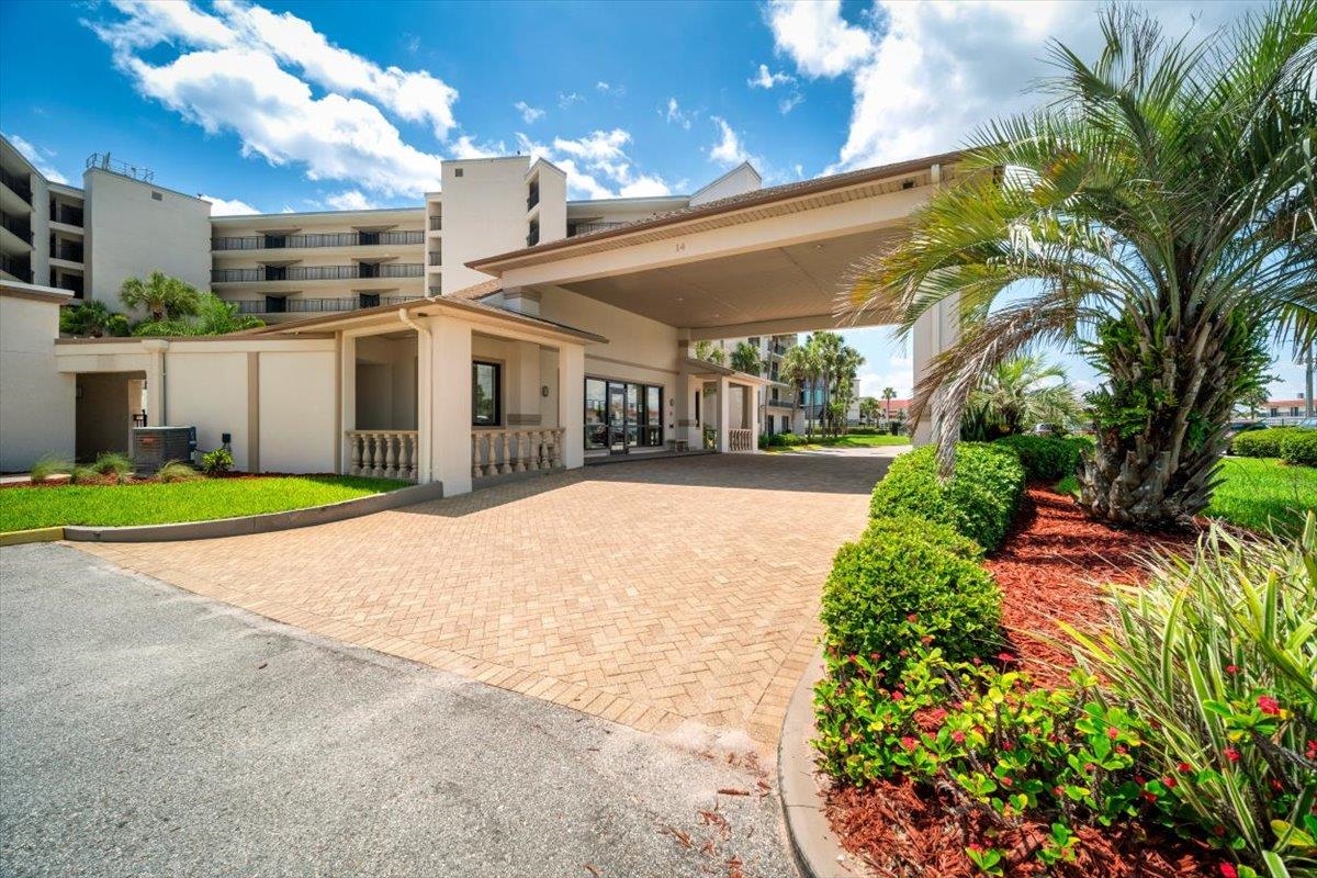 2 Dondanville Road, Unit 115 St. Augustine, FL 32080 - Photo 16 of 36 a view of a house with a yard and potted plants