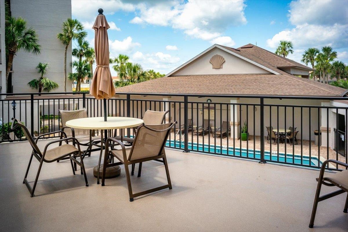 2 Dondanville Road, Unit 115 St. Augustine, FL 32080 - Photo 19 of 36 a view of a patio with a table and chairs