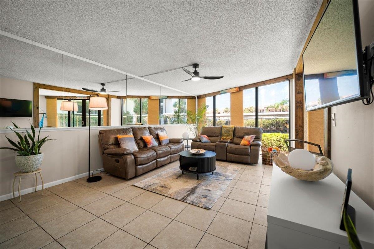 2 Dondanville Road, Unit 115 St. Augustine, FL 32080 - Photo 3 of 36 a living room with furniture and a large window
