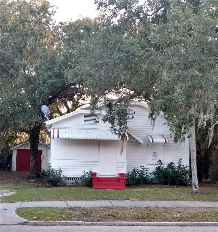 1680 10th Street Sarasota, FL 34236 - Photo 1 of 1 a front view of house with yard