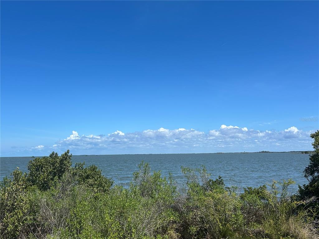 38 65th Street Yankeetown, FL 34498 - Photo 13 of 15 a view of lake with sunset