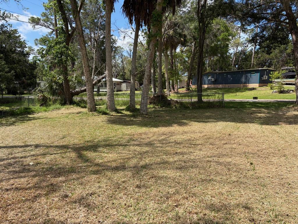 38 65th Street Yankeetown, FL 34498 - Photo 5 of 15 a view of a yard with swimming pool
