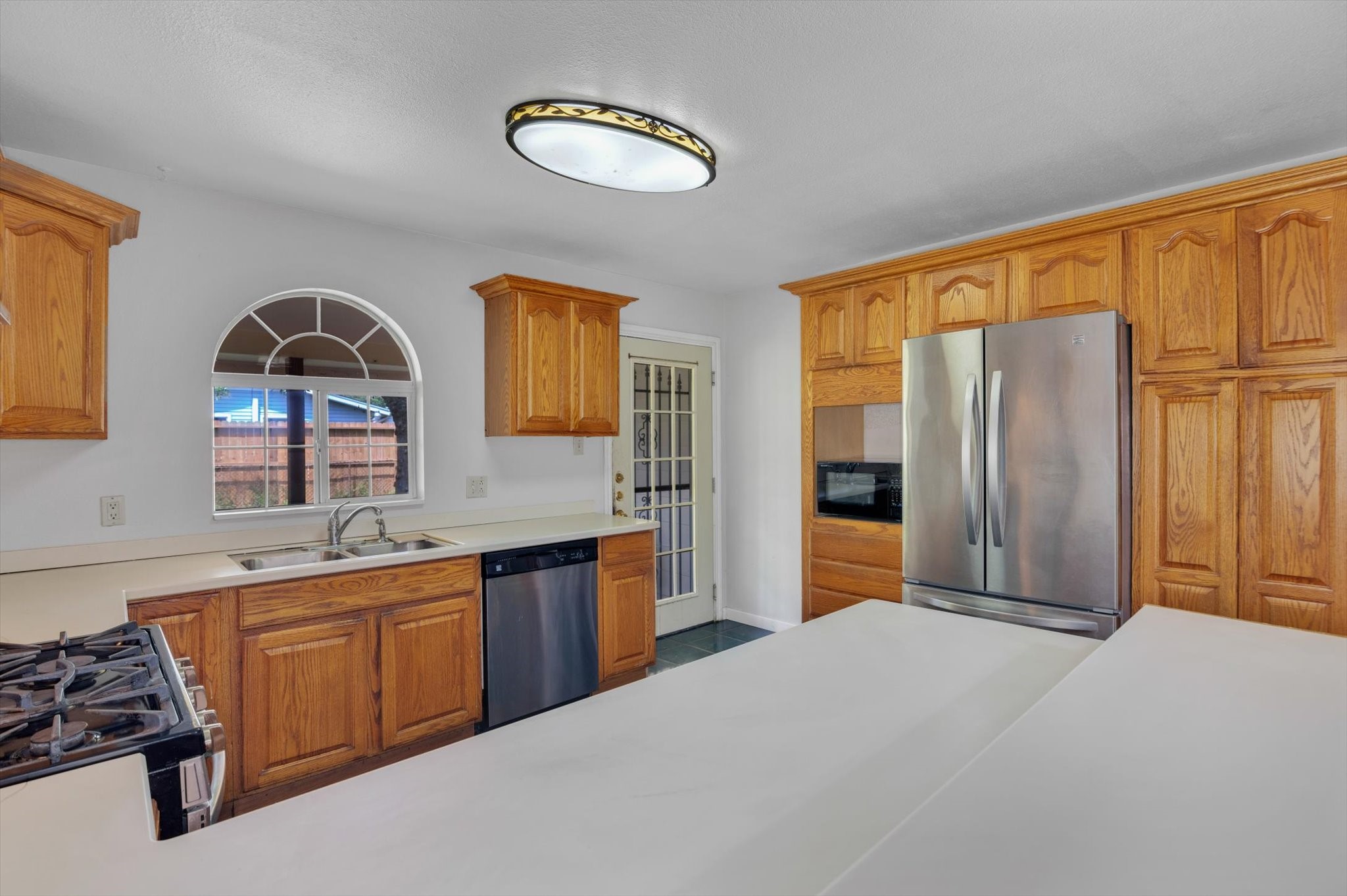 406 Red Ripple Road Houston, TX 77091 - Photo 13 of 37 a bedroom with a bed and a sink
