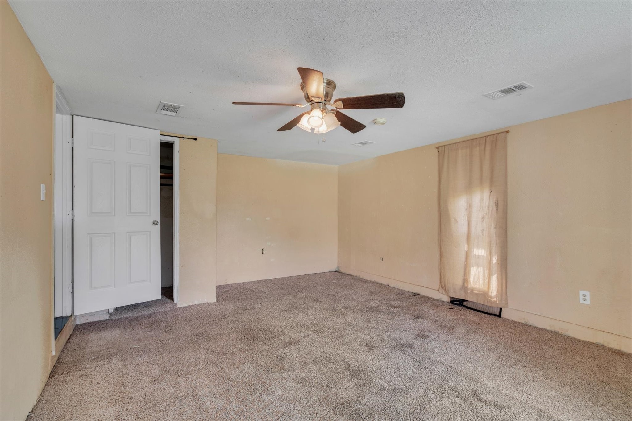 406 Red Ripple Road Houston, TX 77091 - Photo 17 of 37 a view of a livingroom with a ceiling fan window and a chandelier