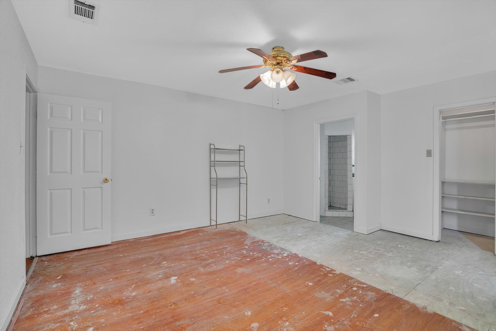 406 Red Ripple Road Houston, TX 77091 - Photo 26 of 37 a view of an empty room with a fan