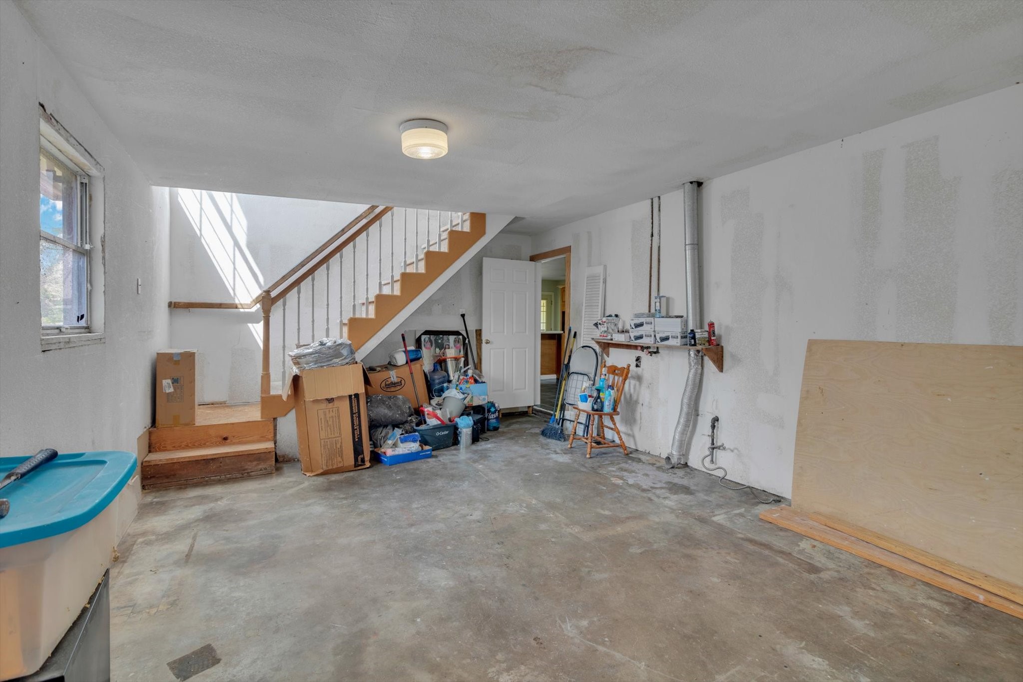 406 Red Ripple Road Houston, TX 77091 - Photo 30 of 37 a view of a livingroom with stairs and furniture