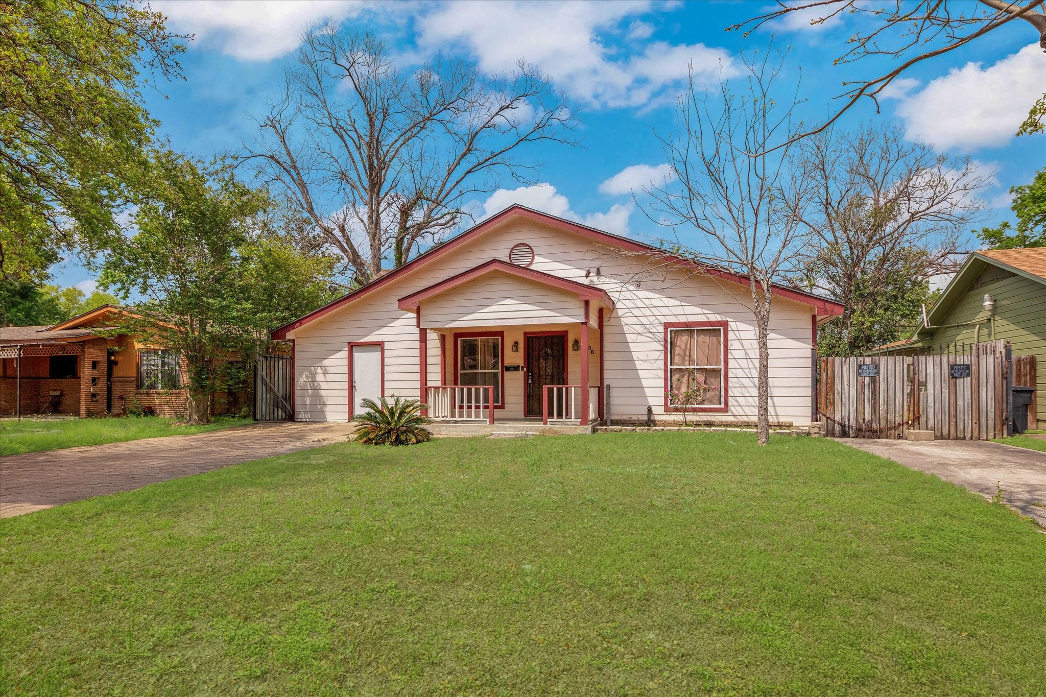 406 Red Ripple Road Houston, TX 77091 - Photo 3 of 37 a front view of a house with a yard