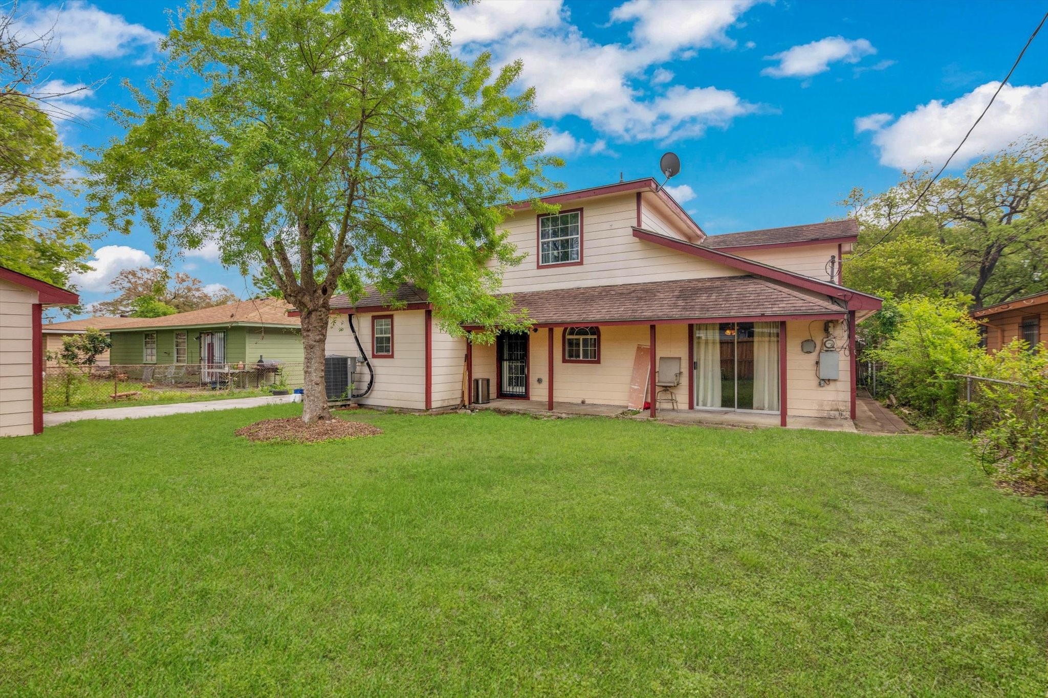 406 Red Ripple Road Houston, TX 77091 - Photo 34 of 37 a front view of a house with a garden