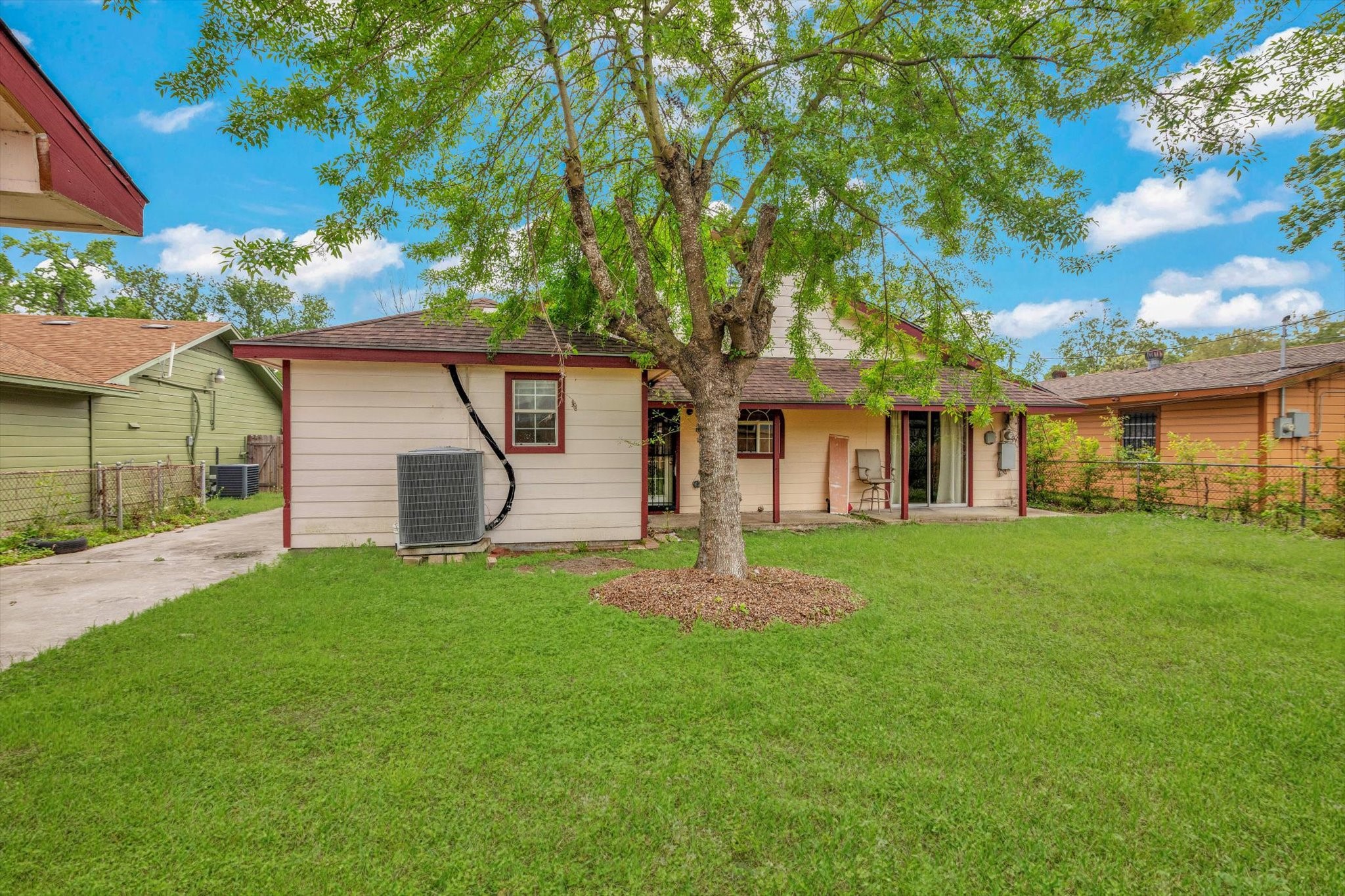 406 Red Ripple Road Houston, TX 77091 - Photo 35 of 37 a front view of a house with a garden