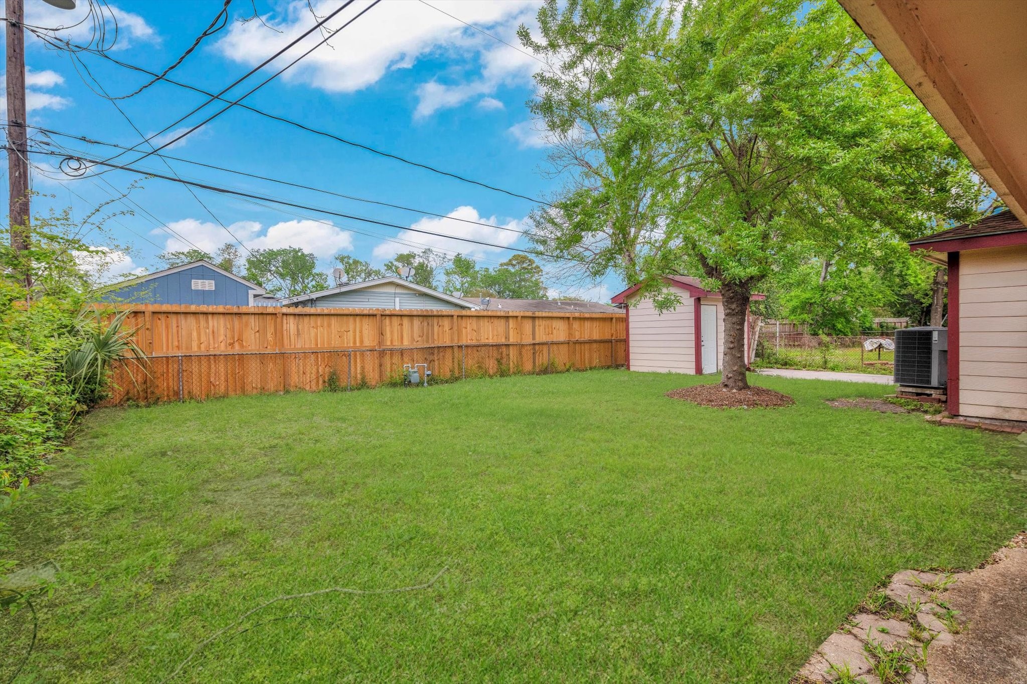 406 Red Ripple Road Houston, TX 77091 - Photo 36 of 37 a view of yard with green space
