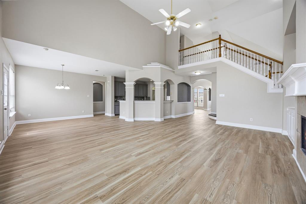1904 Meera Lane Mansfield, TX 76063 - Photo 11 of 35 a view of a room with wooden floor