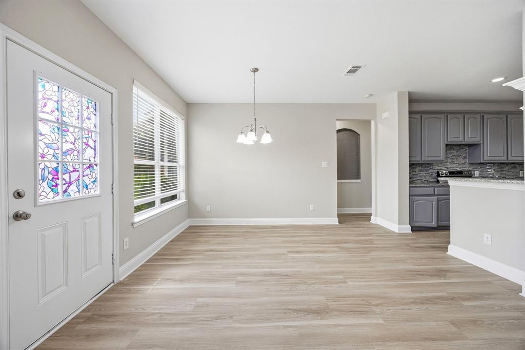 1904 Meera Lane Mansfield, TX 76063 - Photo 15 of 35 a view of an empty room with a window