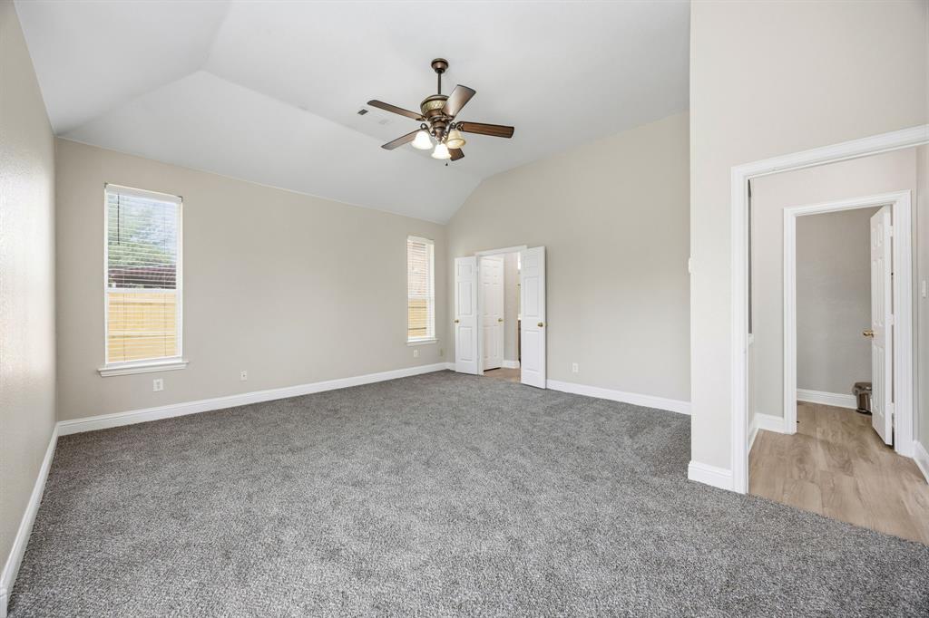 1904 Meera Lane Mansfield, TX 76063 - Photo 21 of 35 a view of a livingroom with a ceiling fan and window