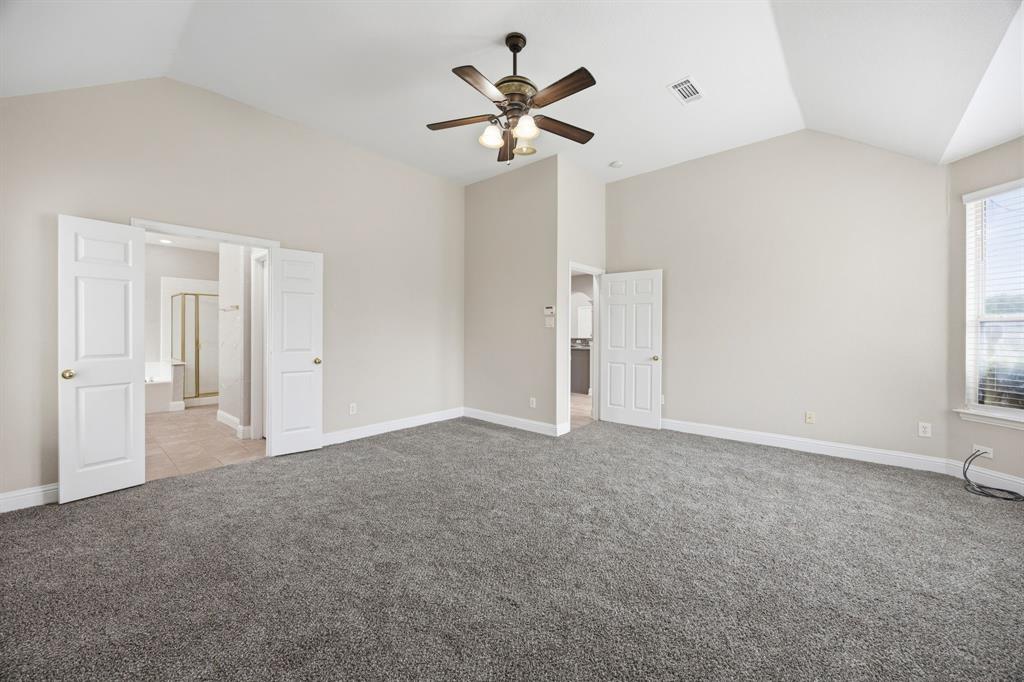 1904 Meera Lane Mansfield, TX 76063 - Photo 22 of 35 a view of an empty room with a window