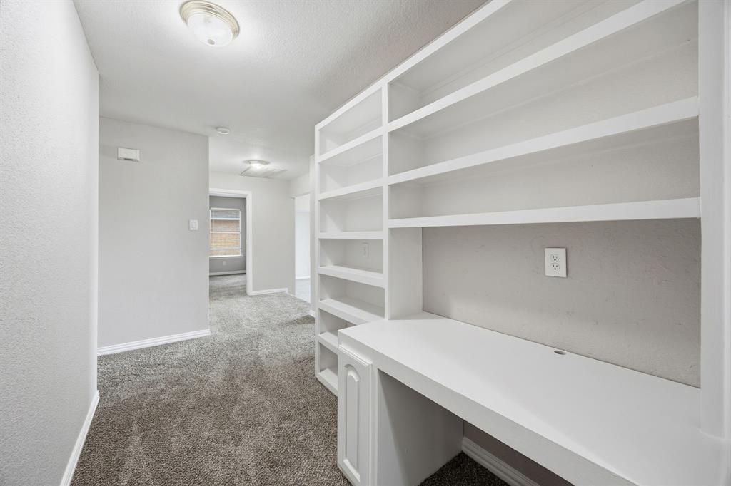 1904 Meera Lane Mansfield, TX 76063 - Photo 26 of 35 a room with a furniture and empty room