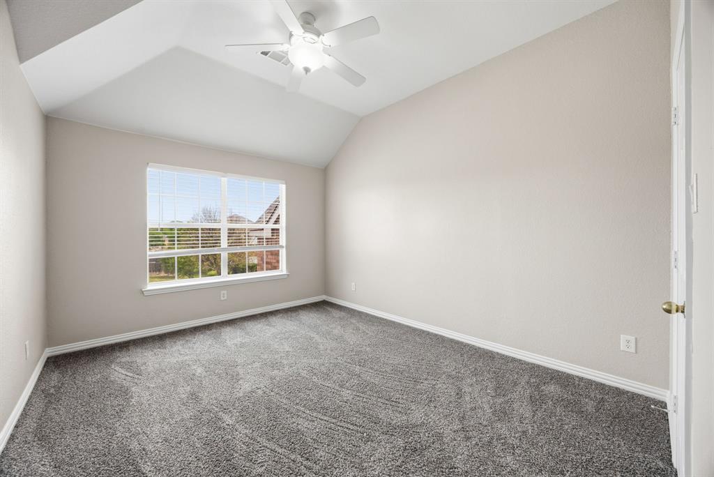 1904 Meera Lane Mansfield, TX 76063 - Photo 27 of 35 an empty room with a window