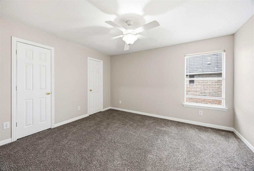 1904 Meera Lane Mansfield, TX 76063 - Photo 31 of 35 a view of an empty room with a window
