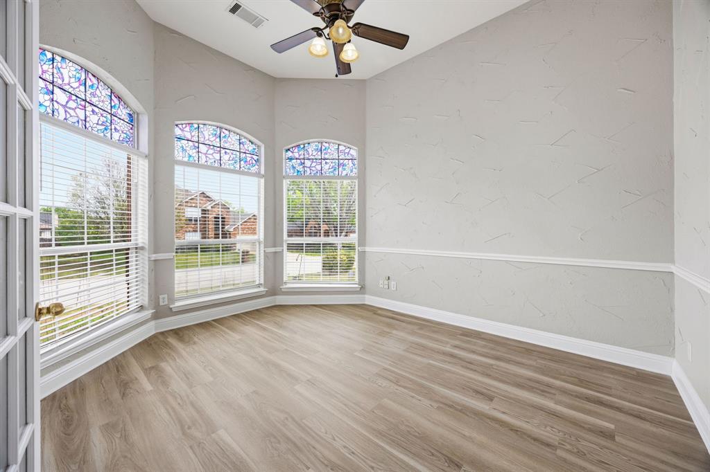 1904 Meera Lane Mansfield, TX 76063 - Photo 5 of 35 a view of an empty room with a window