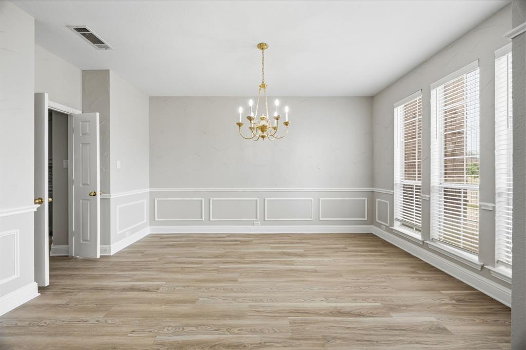1904 Meera Lane Mansfield, TX 76063 - Photo 7 of 35 a view of an empty room with a window