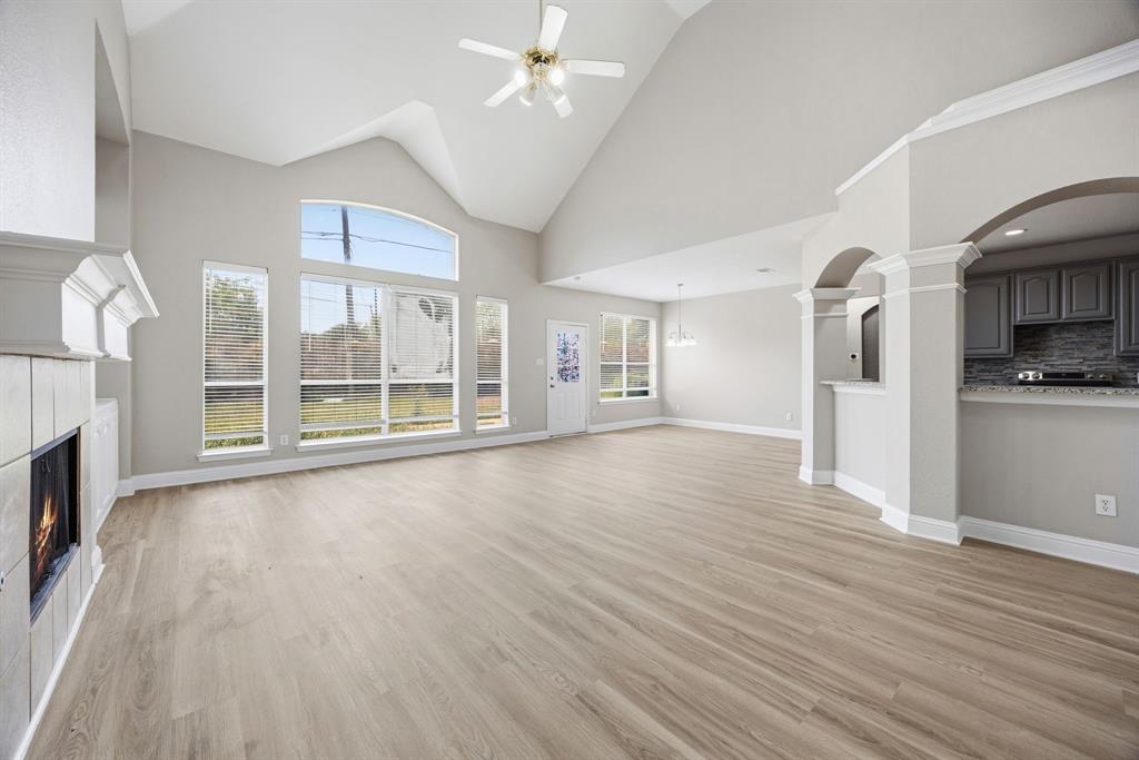 1904 Meera Lane Mansfield, TX 76063 - Photo 10 of 35 a view of a livingroom with wooden floor