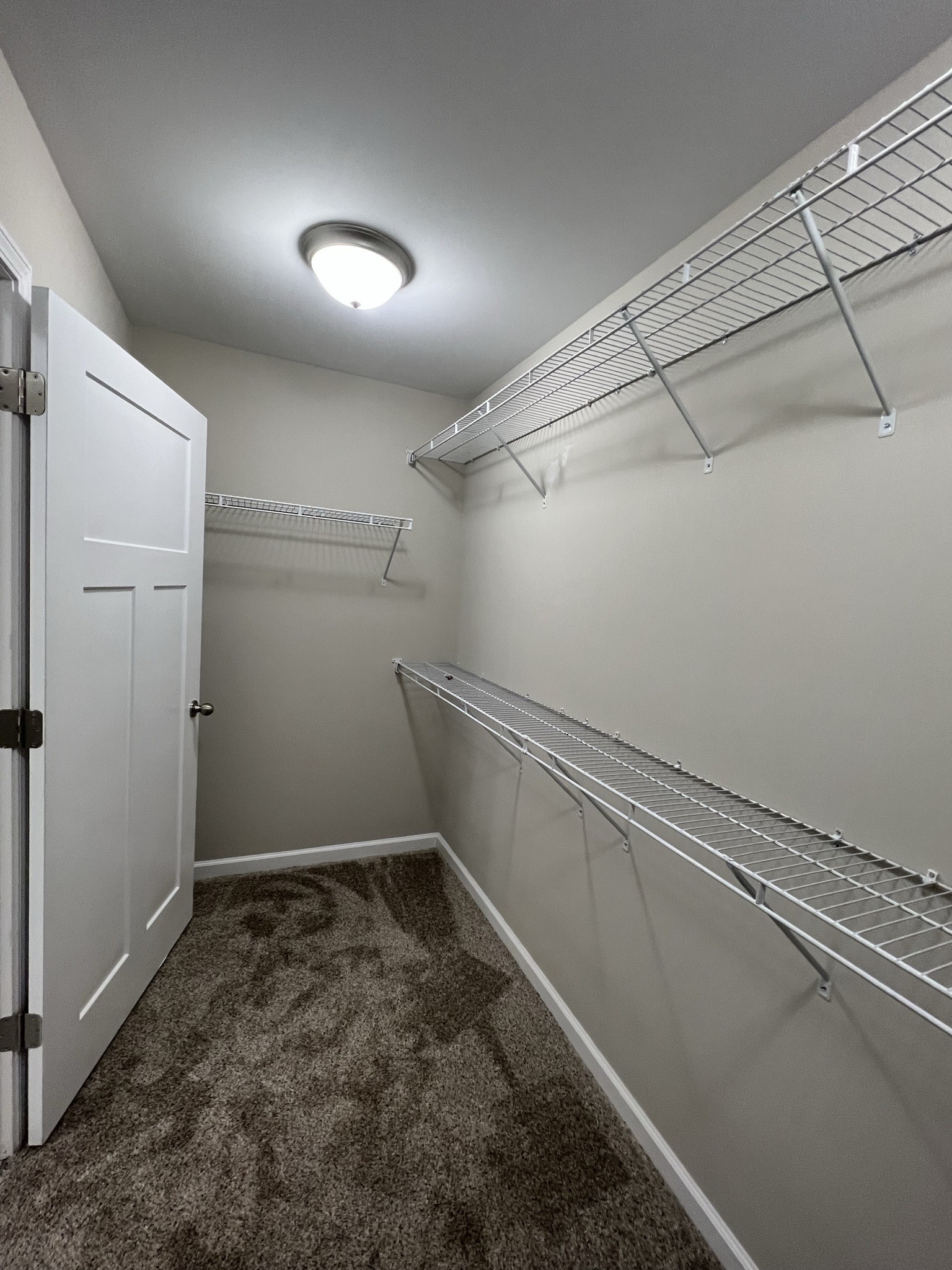 1669 New Deal Potts Road Portland, TN 37148 - Photo 16 of 17 a view of a room with racks on the wall