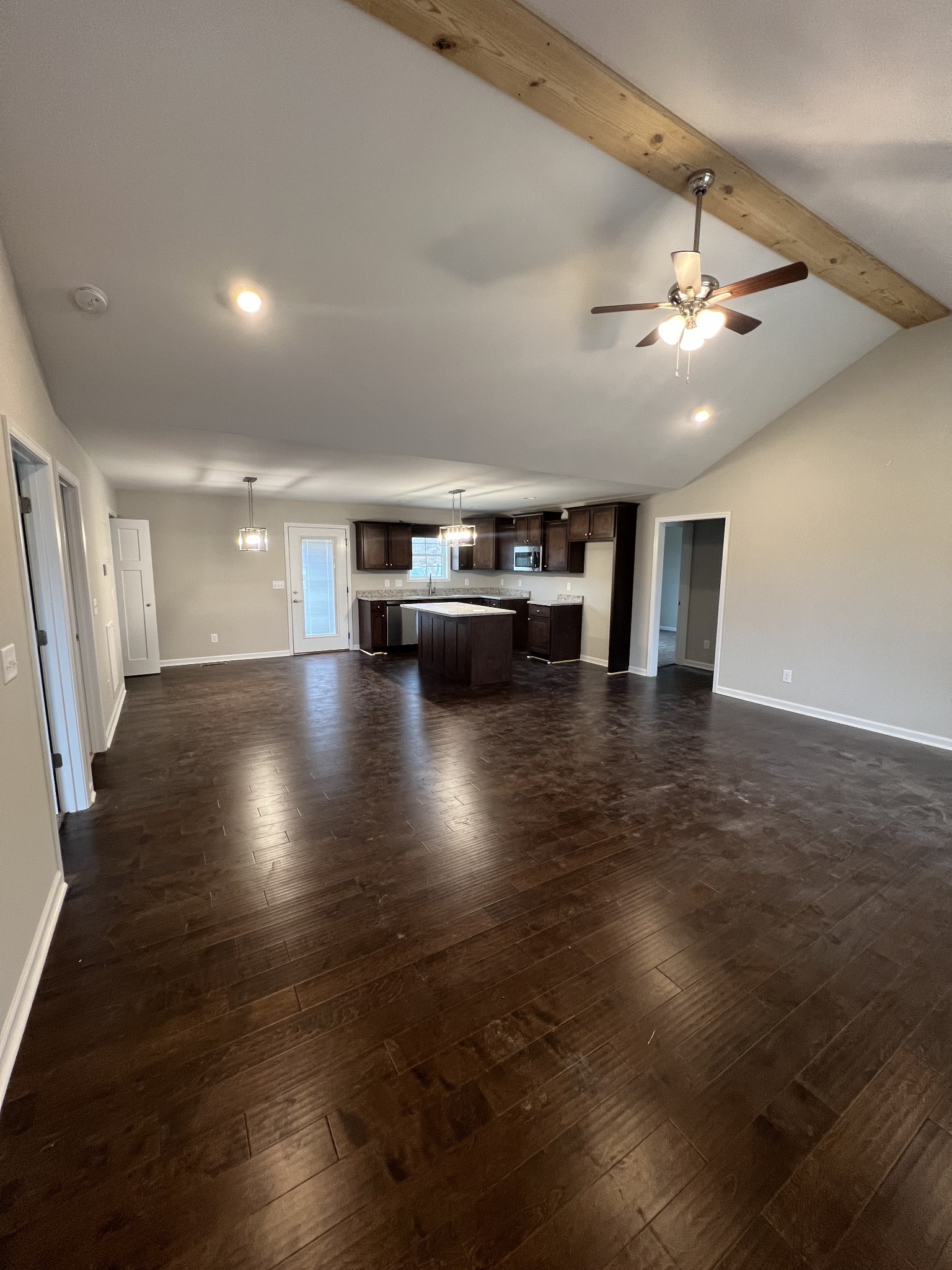 1669 New Deal Potts Road Portland, TN 37148 - Photo 6 of 17 an empty room with wooden floor and windows