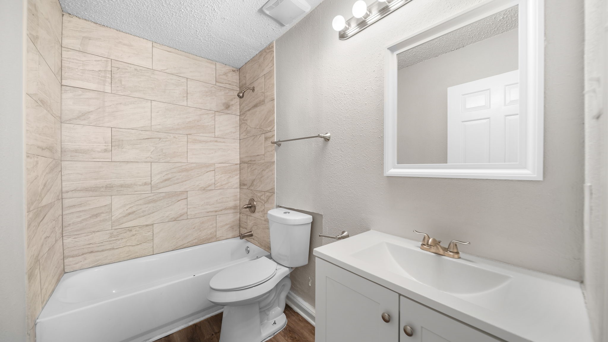 2363 Virginia Avenue Montgomery, TX 77316 - Photo 13 of 19 a bathroom with a sink toilet and shower