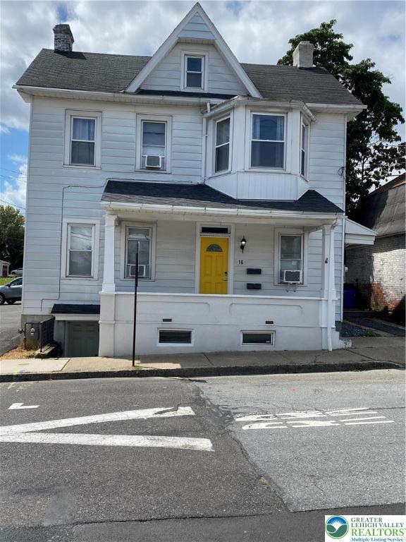 16 South 3rd Street, Unit 1 Emmaus, PA 18049 - Photo 1 of 12 a front view of a house with a road