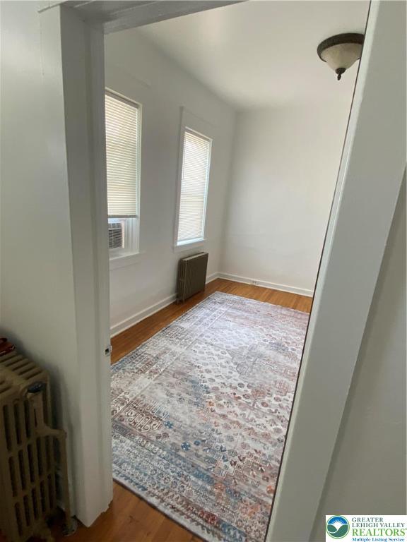 16 South 3rd Street, Unit 1 Emmaus, PA 18049 - Photo 6 of 12 wooden floor in an empty room with a window