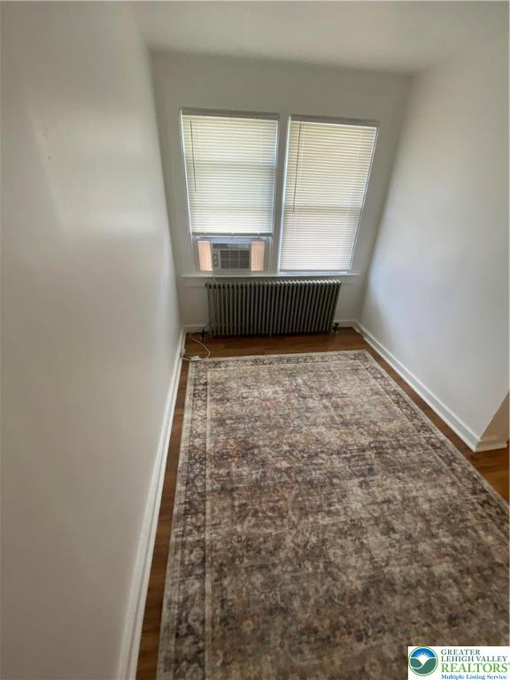 16 South 3rd Street, Unit 1 Emmaus, PA 18049 - Photo 8 of 12 an empty room with wooden floor and windows