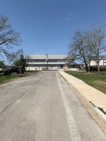 a view of a terrace with yard