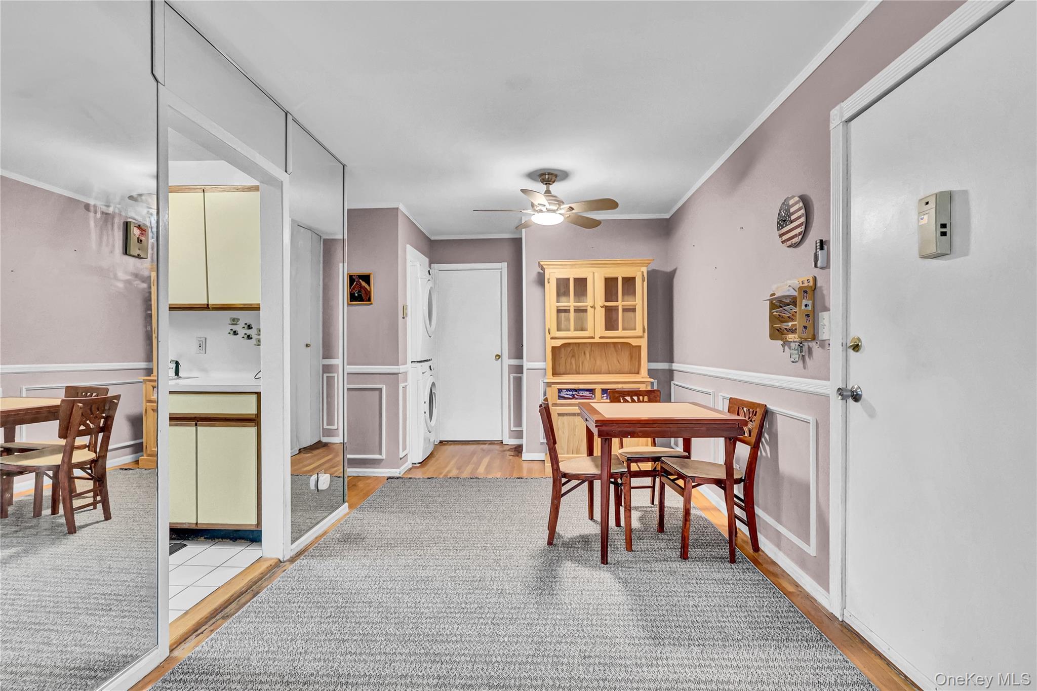 20 Toehee Place, Unit 2B Islip, NY 11751 - Photo 2 of 25 a dining room with furniture and window