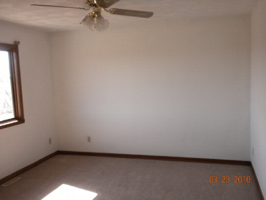 581 McCurry Road Caledonia, IL 61011 - Photo 6 of 8 a view of a room with a fan and a window