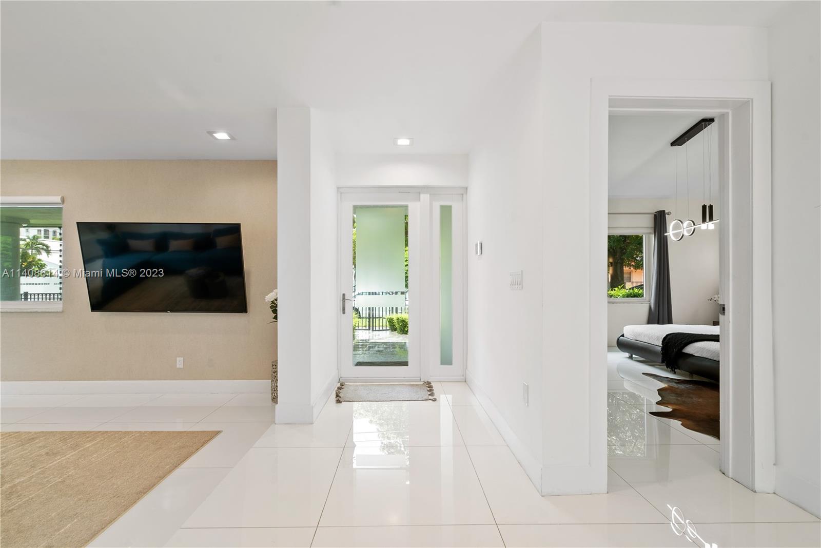 401 Southwest 23rd Road Miami, FL 33129 - Photo 19 of 43 a view of a hallway with a livingroom and a living room