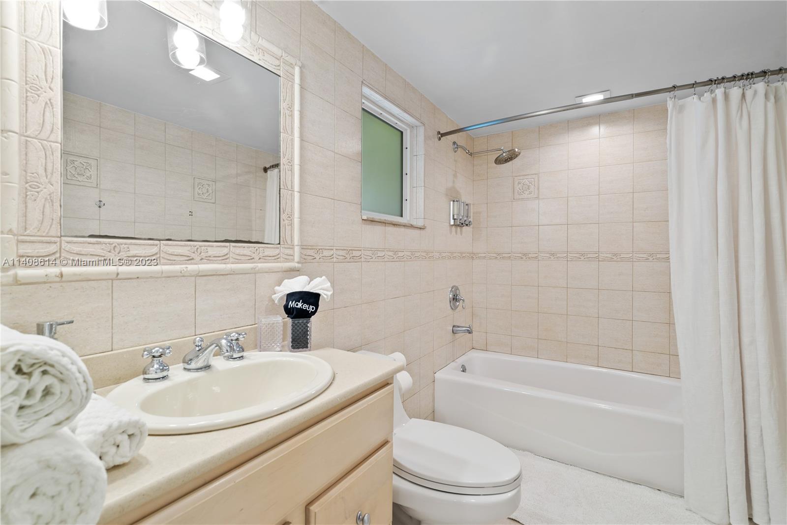 401 Southwest 23rd Road Miami, FL 33129 - Photo 23 of 43 a bathroom with a sink toilet and shower