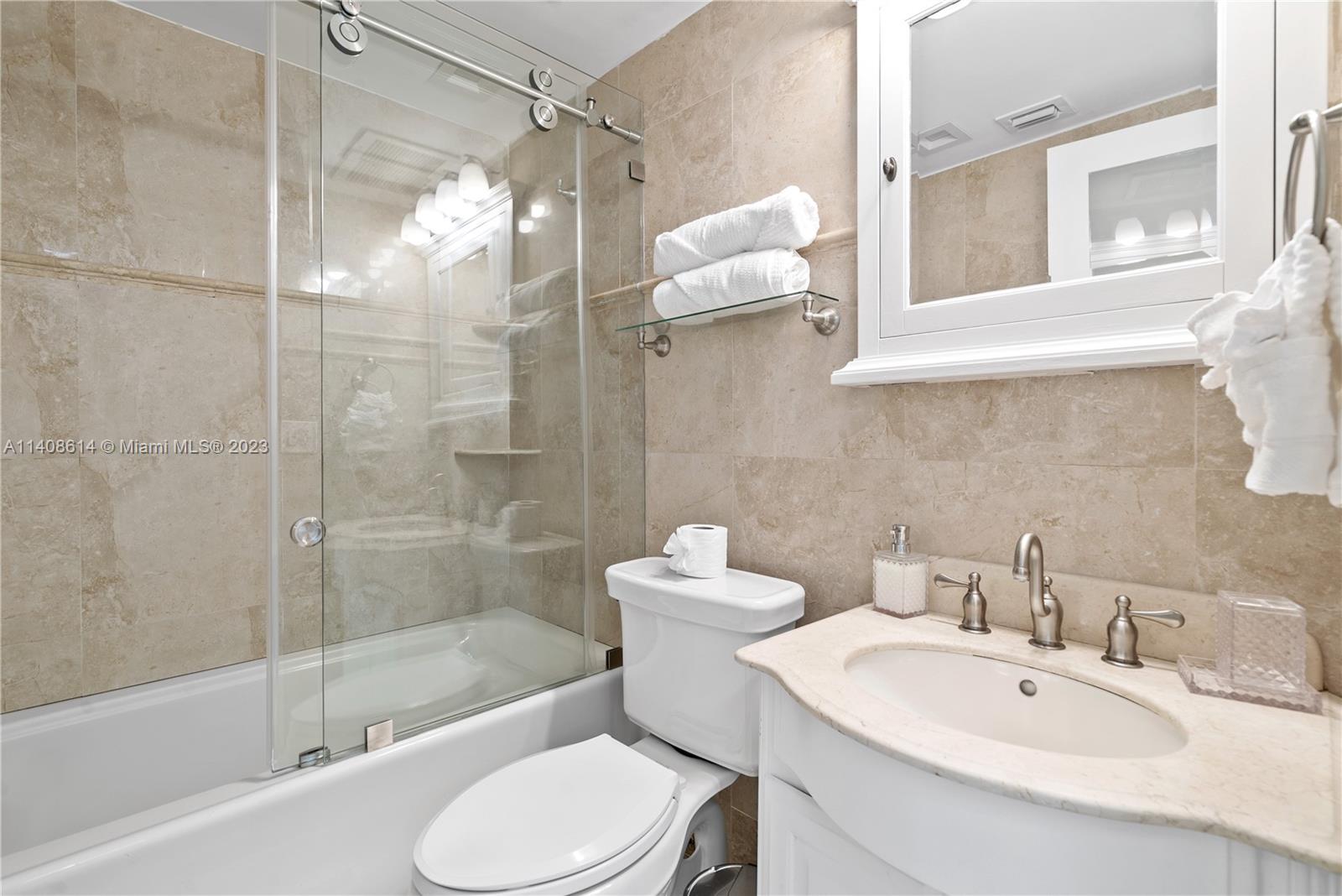 401 Southwest 23rd Road Miami, FL 33129 - Photo 24 of 43 a bathroom with a sink toilet and shower