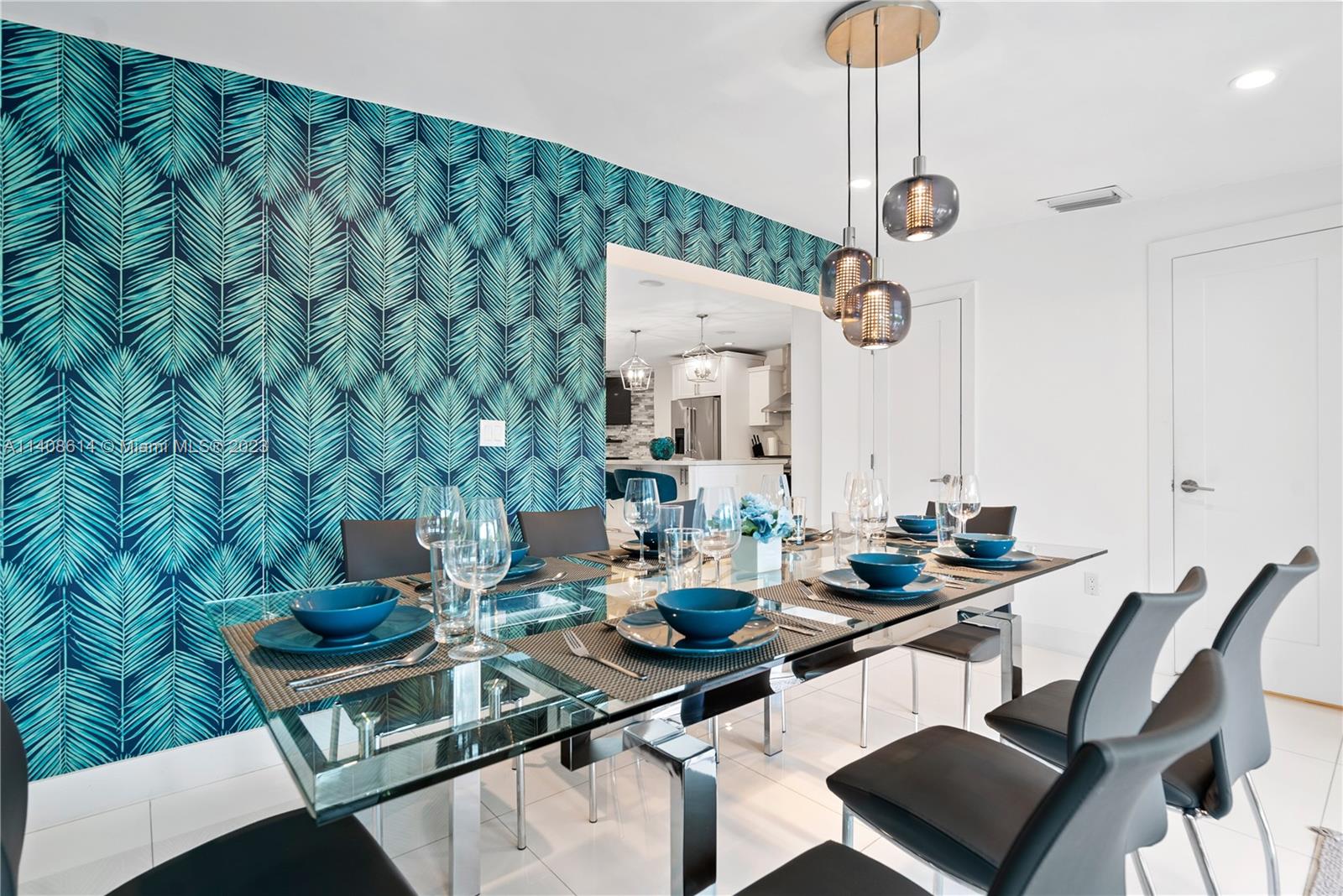 401 Southwest 23rd Road Miami, FL 33129 - Photo 36 of 43 a view of a dining room with furniture and chandelier