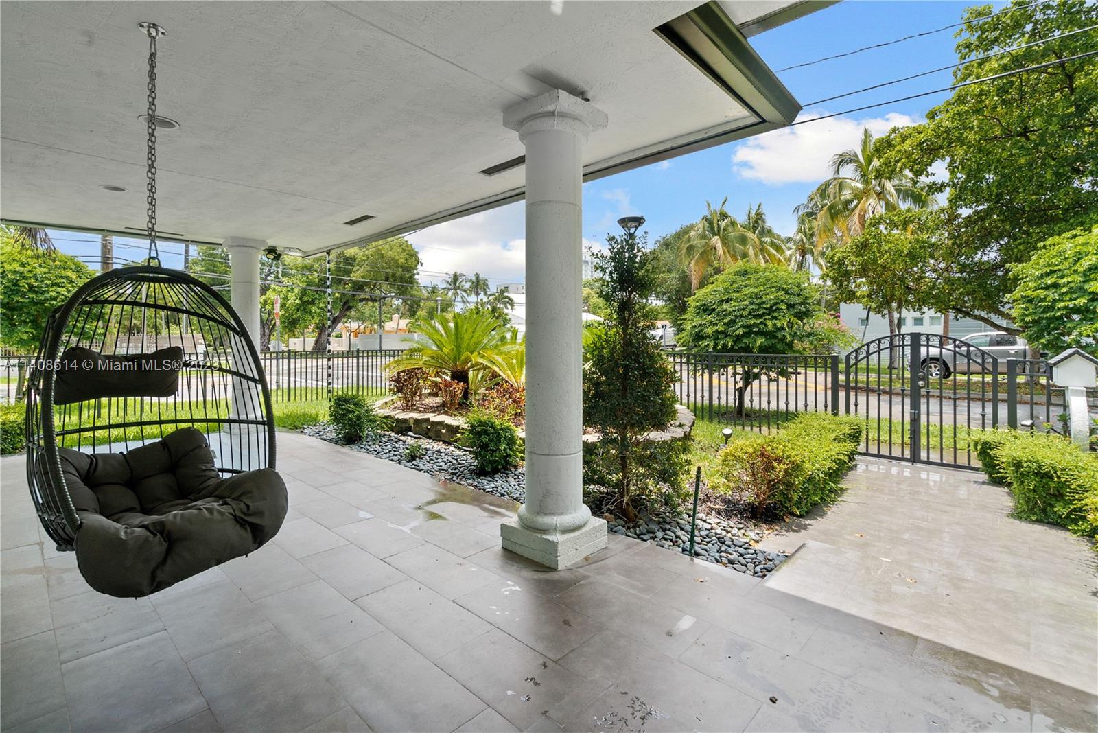 401 Southwest 23rd Road Miami, FL 33129 - Photo 40 of 43 a view of a porch with furniture