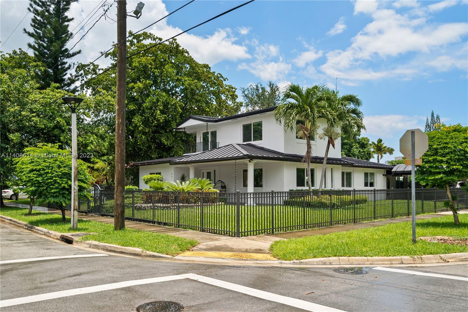 401 Southwest 23rd Road Miami, FL 33129 - Photo 42 of 43 a view of a house with a yard and plants