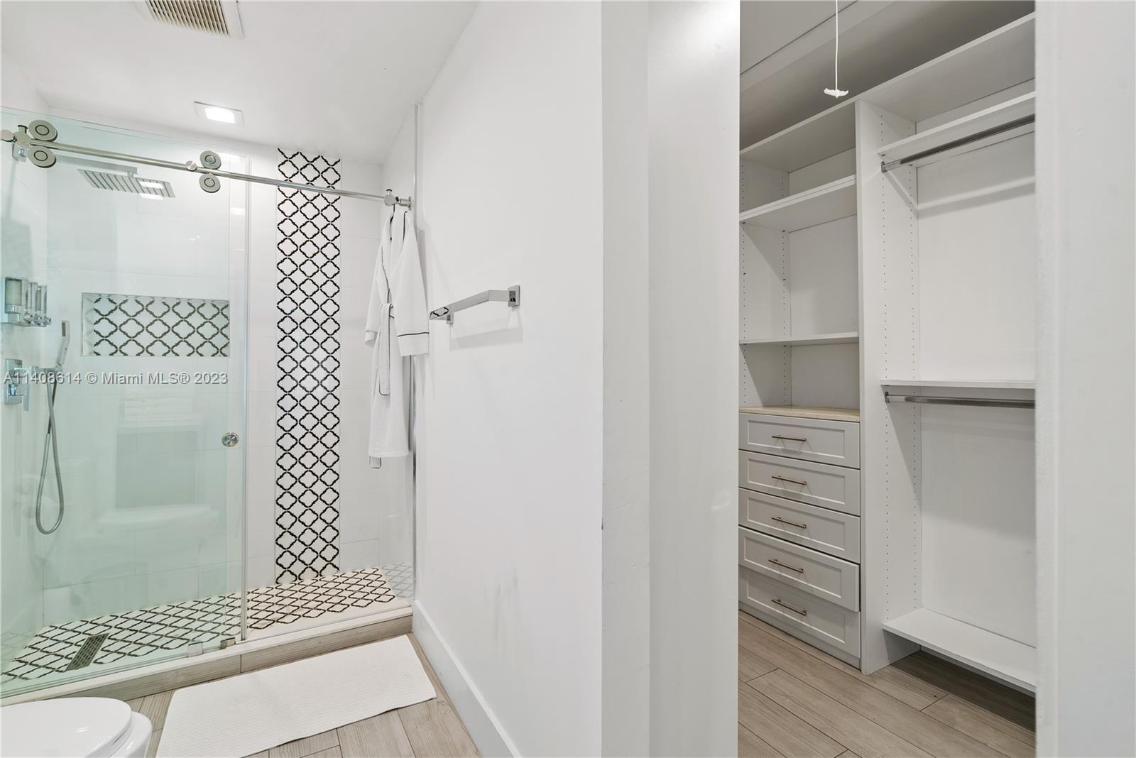 401 Southwest 23rd Road Miami, FL 33129 - Photo 9 of 43 a view of walk in closet and bathroom