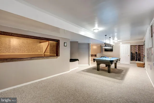 a bathroom with a double vanity sink and mirror