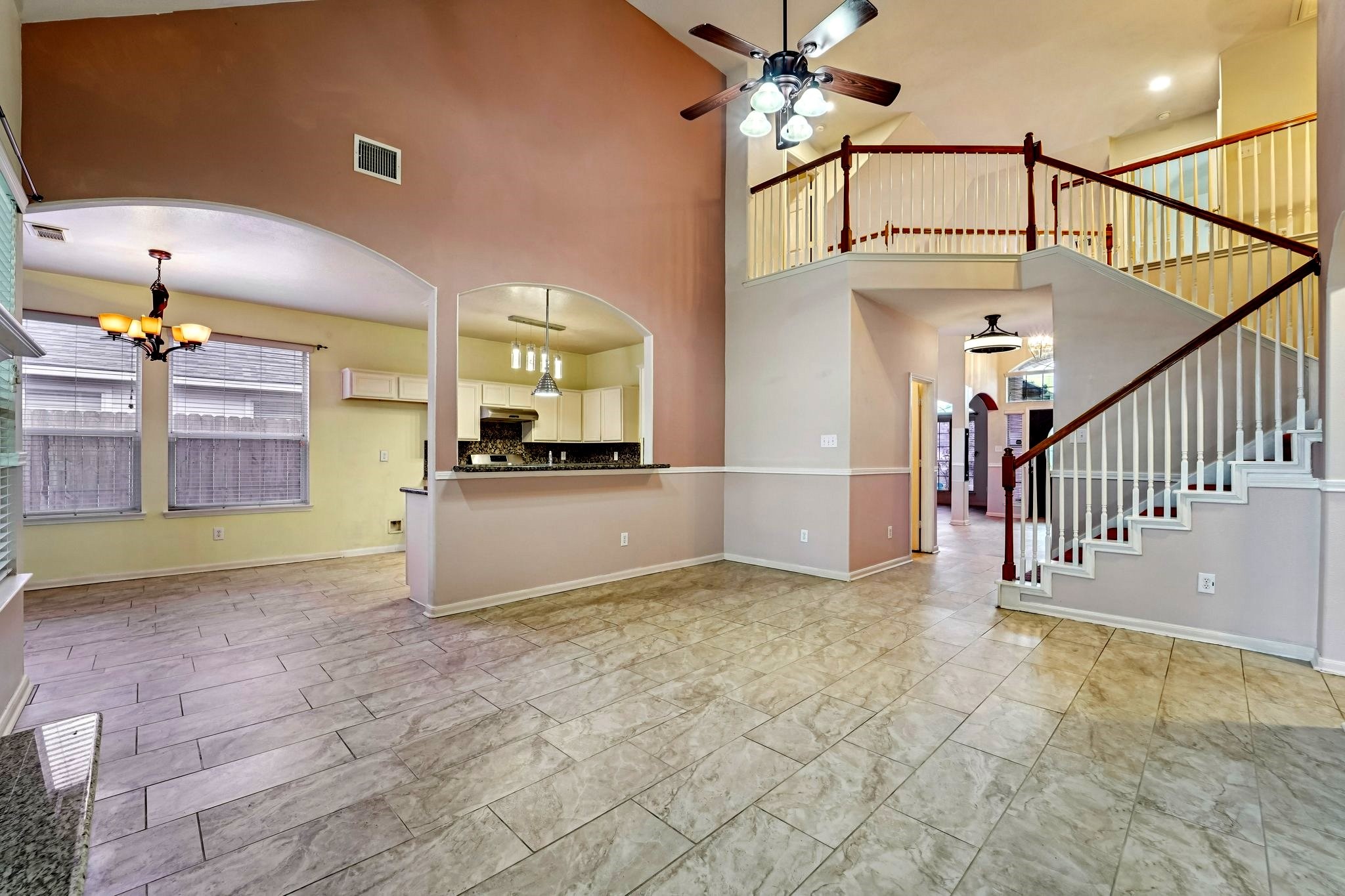 3818 Ridge Canyon Road Baytown, TX 77521 - Photo 12 of 32 a view of a kitchen with a sink and a kitchen view