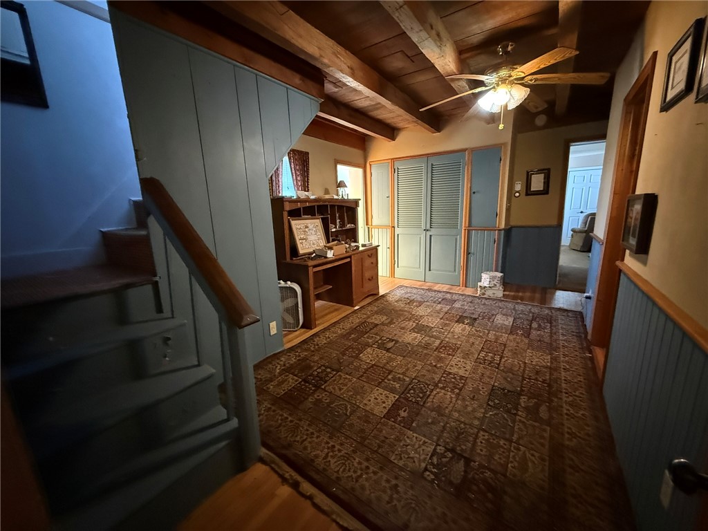 6617 Sweet Potato Ridge Road Englewood, OH 45322 - Photo 32 of 33 This inviting interior features rustic beamed ceilings and traditional wood flooring.